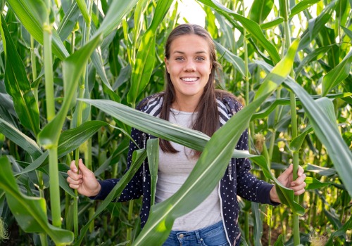 Woman posing in a corn maze in Davenport IA