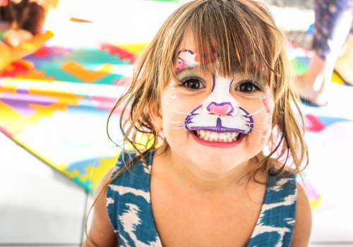 A child gets her face painted as part of the Family Activities for Freeport IL that are available at Tanners Orchard