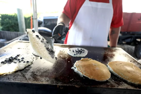 Blueberry pancakes being made at an event at Tanners Orchard